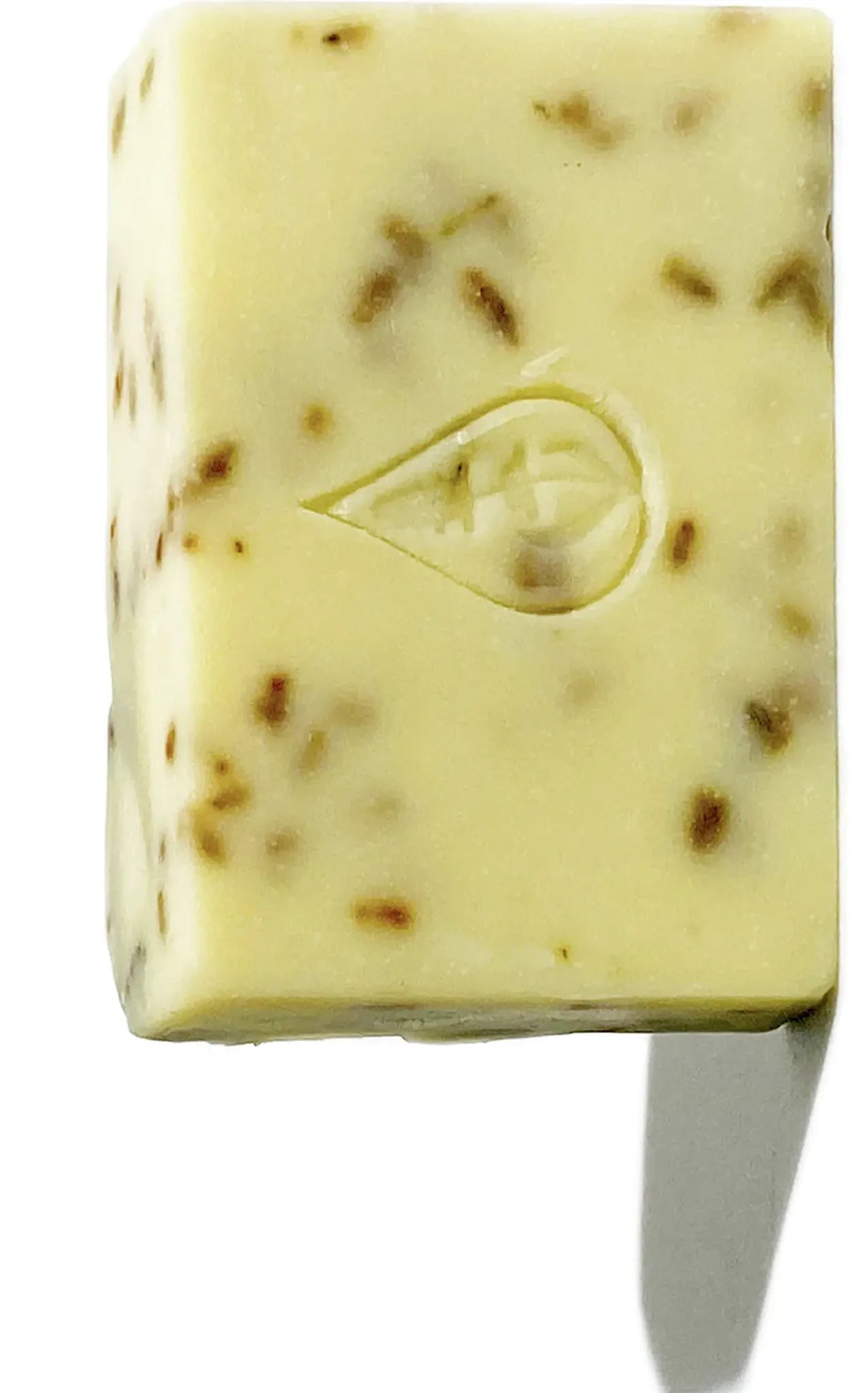 By Valenti Lavender & Lime Bar Soap with lavender buds and By Valenti logo visibly stamped on the soap on a white background