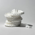 Stacked By Valenti set of 7 small white cotton facial cleansing pads on a light gray background