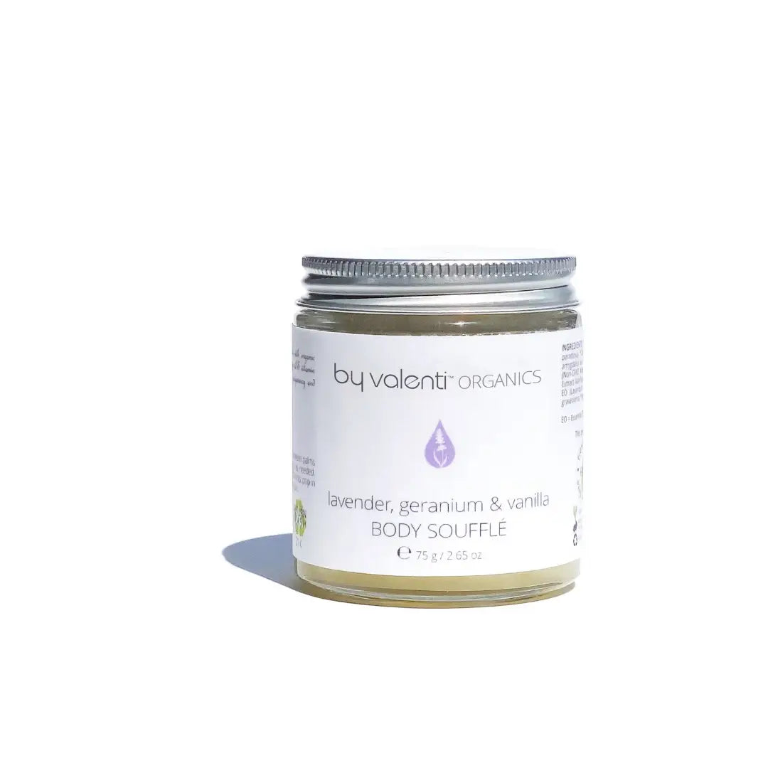Glass jar of 'by valenti' Organics lavender, geranium & vanilla whipped body butter cream on a white background