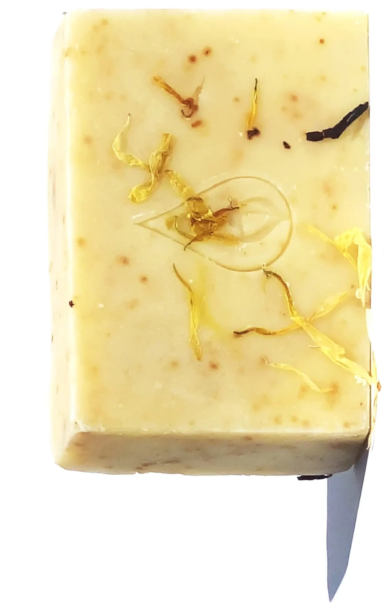 By Valenti Oriental Passion Bar Soap  with dried calendula flower petals on a white background